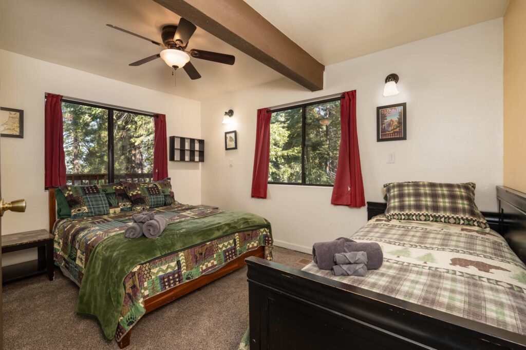 bedroom with queen bed and twin bed