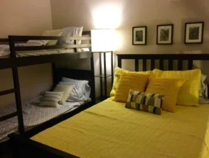 bedroom with full bed and bunk bed