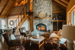 living area with stone fireplace and seating