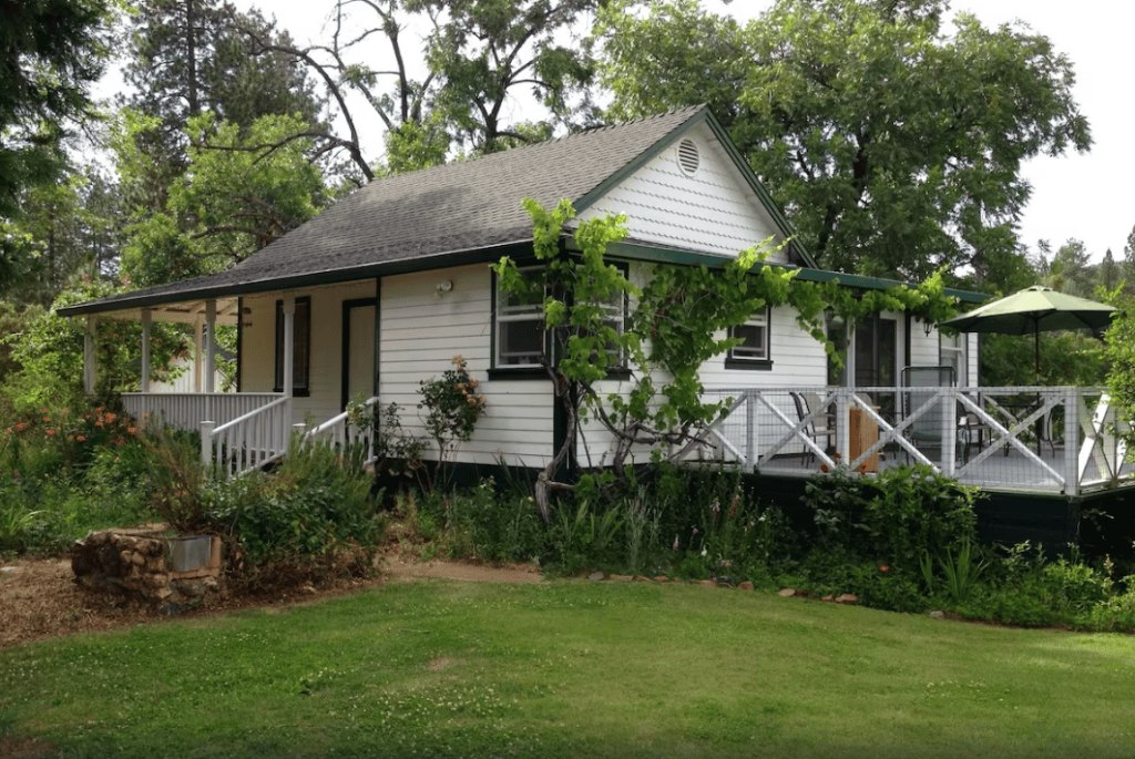 exterior of cottage, outdoor seating on deck