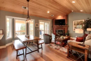 living room with television and fireplace