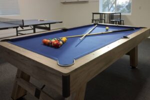 game room with pool table and ping pong table