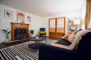 primary bedroom seating area with fireplace